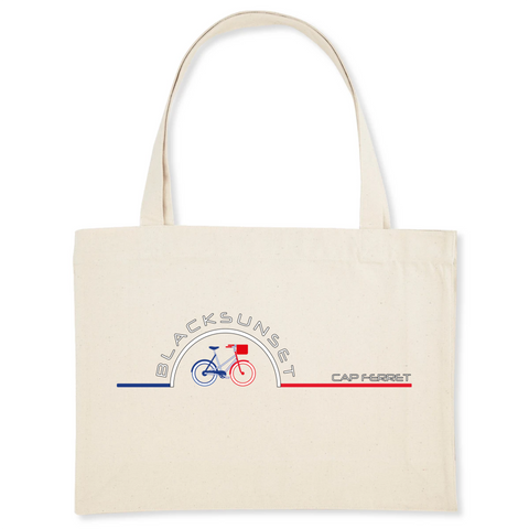 Pour faire vos courses ou tout simplement aller à la plage en toute élégance, optez pour ce sac de qualité. Imprimé en France, ses finitions lui procurent solidité et qualité. Estampillé Label GOTS, il est composé à 80% de coton recyclé. Motif : Vélo intégré dans le logo Black SunSet Cap Ferret